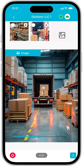 App camera screen photographing a loaded trailer with thumbnails of previous shots